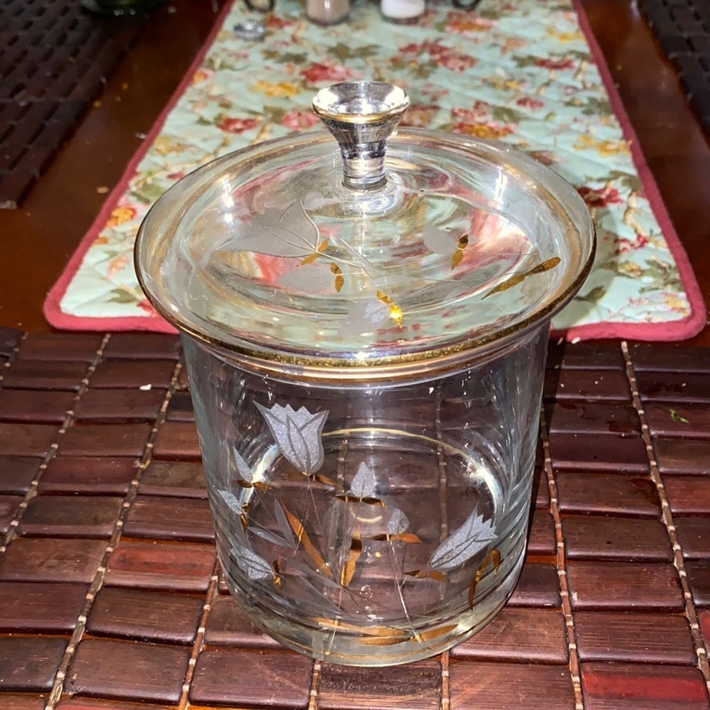 Vintage crystal flower design bowl with lid perfect for holding candy or cotton.